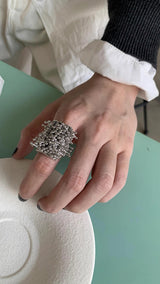 Bold silver line ball tassel ring