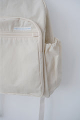 an everywhere daypack, cream beige