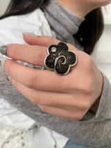 Black flower point ring