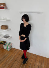 BUTTON MIDI PLEATS SKIRT