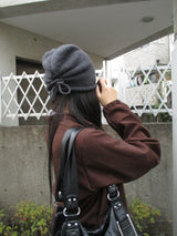 roll up string beanie
