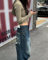 Back damage denim pants