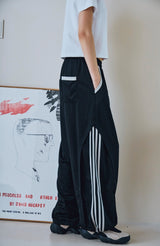 26SS★ Curved Line Track Pants