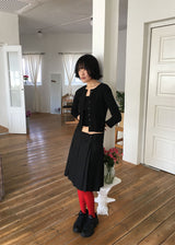 BUTTON MIDI PLEATS SKIRT