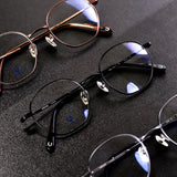 Knouun Round titanium glasses CODE. 101. A gray