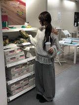 Peto Loose Fit Pendant Lip Neck One-Shoulder Knit