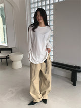 CURVED TUCK COTTON TROUSER