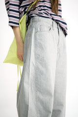 over wide gray pants