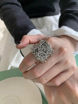 Bold silver line ball tassel ring