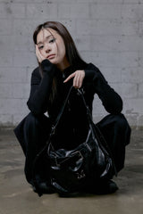 MONIC METAL LOGO FRONT BELTED LEATHER SHOULDER BAG UNISEX