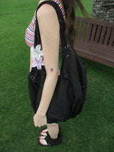 eyelet point shoulder bag