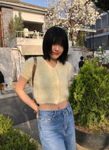 コンペルカーディガン