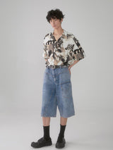 Cuban-style loose and breathable short-sleeved shirt with black and white portrait blur print.