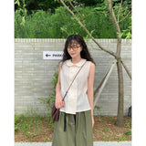 burring sleeveless blouse