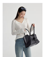 V-neck flared sleeve knit top