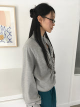 フリンジシャーリングプリーツハイネックジップアップ