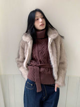 タートルネックツイストストラップスリーブレスニットウェア