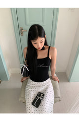 Marshmallow beaded black sleeveless top