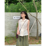 burring sleeveless blouse