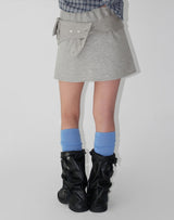 TINY BUTTON MINI SKIRT