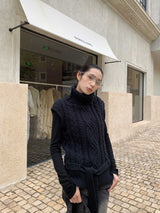 タートルネックツイストストラップスリーブレスニットウェア