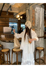 Beige knit hat, bucket hat