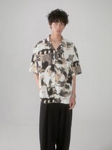 Cuban-style loose and breathable short-sleeved shirt with black and white portrait blur print.