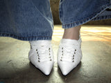 Sneakers point heels