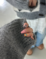 Nyangdeng's nose-dishon tteokbokki knit cardigan