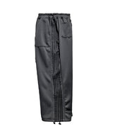 Solid track line two way training pants