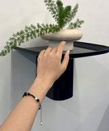 mere black bracelet