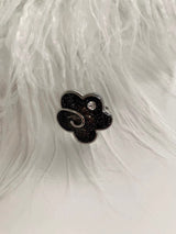 Black flower point ring