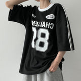 オートトラックラインバンドボクシーフィットショートスリーブTシャツ