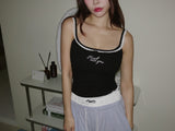 Lace lettering padded sleeveless shirt with a built-in cap