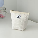 classic pouch_flower ivory