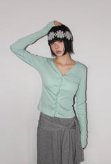 TWIST BUTTON CARDIGAN