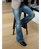Knife boots cut denim pants