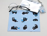 glasses cleaner a tuxedo cat
