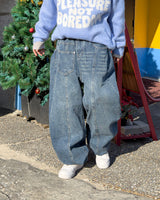 Reverse curved cut denim