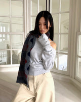 Rudan Lip-Neck Button Knit
