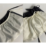 ヨコノサテンフリルストラップラップレイヤードスカート [ CHARCOAL ONLY ]