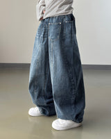 Reverse curved cut denim