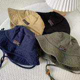On the Moment reversible outdoor bucket hat C1 BEIGE