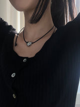 String heart necklace