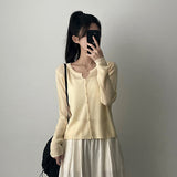 Teak Daily ボタンニットカーディガン
