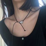 String heart necklace