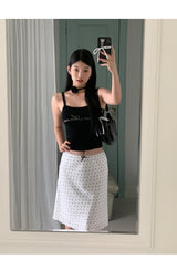 Marshmallow beaded black sleeveless top