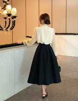 Cave Pearl Tie Puff Blouse