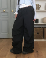 Qiya Glossy Shirring Parasuit Slit Wide Pants