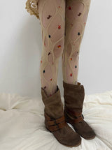 Beige big punching stockings